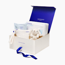 Coterie The Newborn Gift Set, Size Newborn Diapers (31 Count) & Size 1 (33 Count), 1 Travel Size Pack Baby Wipes (18 Count), Plant Based Materials, Hypoallergenic for Sensitive Skin, Baby Essentials
