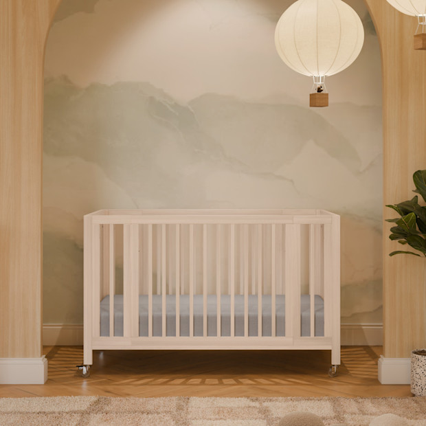 Rolli 9-in-1 Convertible All-Stages Crib with Bassinet & Toddler Bed Conversion Kits.