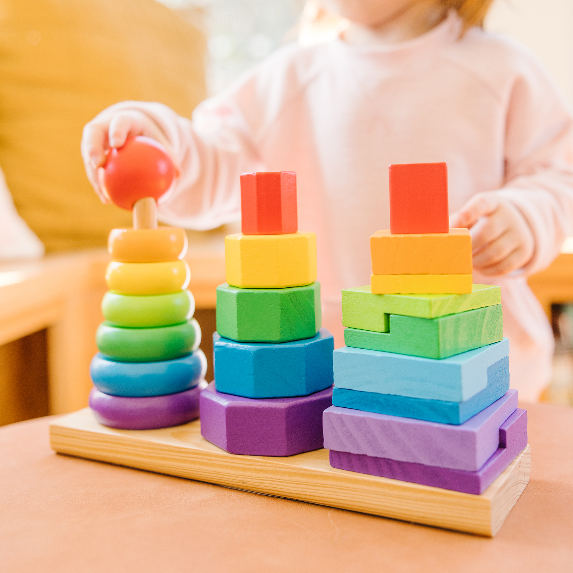 Melissa & Doug Geometric Stacker Wooden Educational Toy.