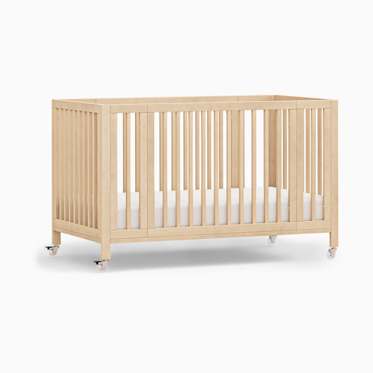 babyletto Rolli 9-in-1 Convertible All-Stages Crib with Bassinet & Toddler Bed Conversion Kits - Blonde.