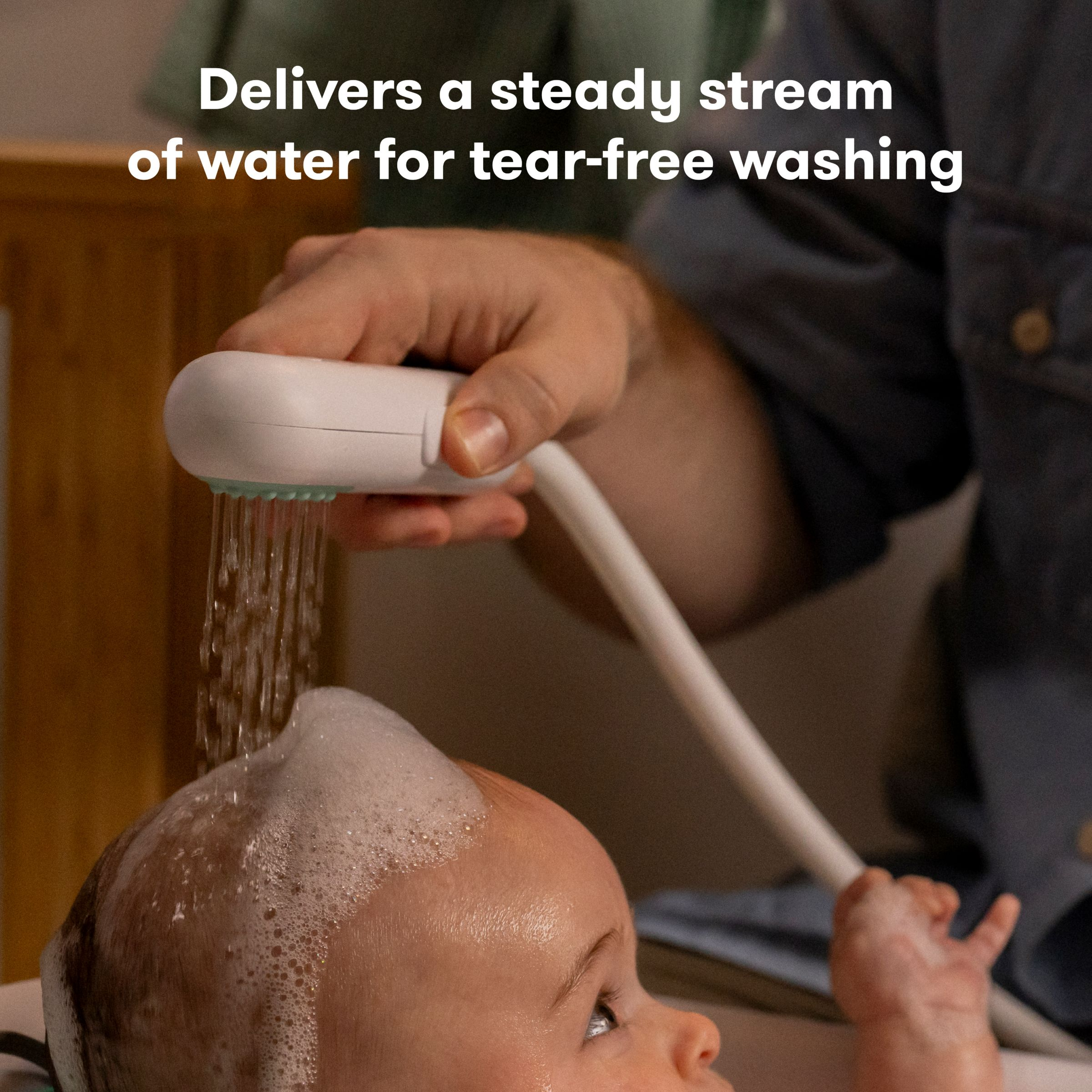 Frida Baby Control the Flow Bath Sprayer.