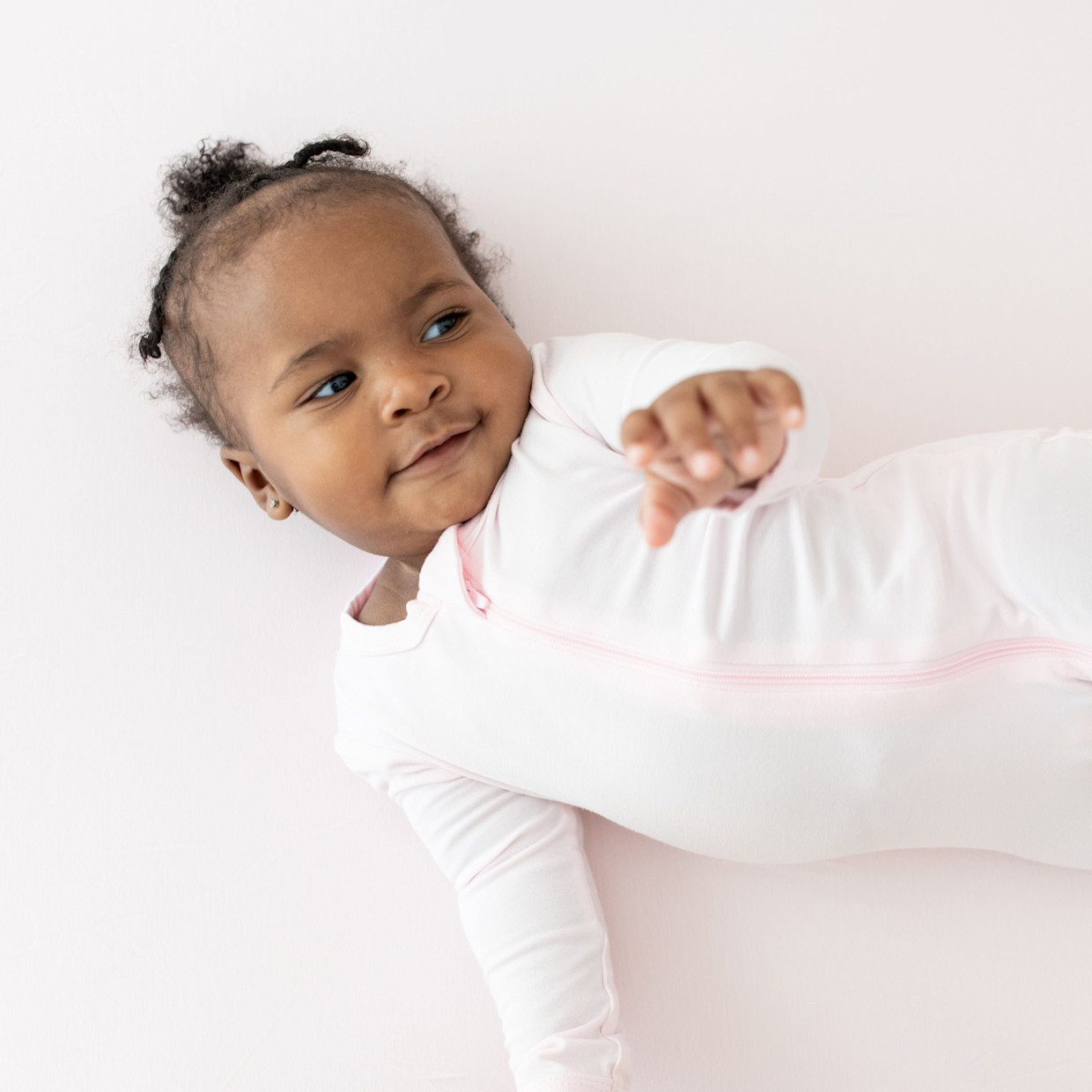 Kyte Baby Zipper Footie - Sakura, Newborn.