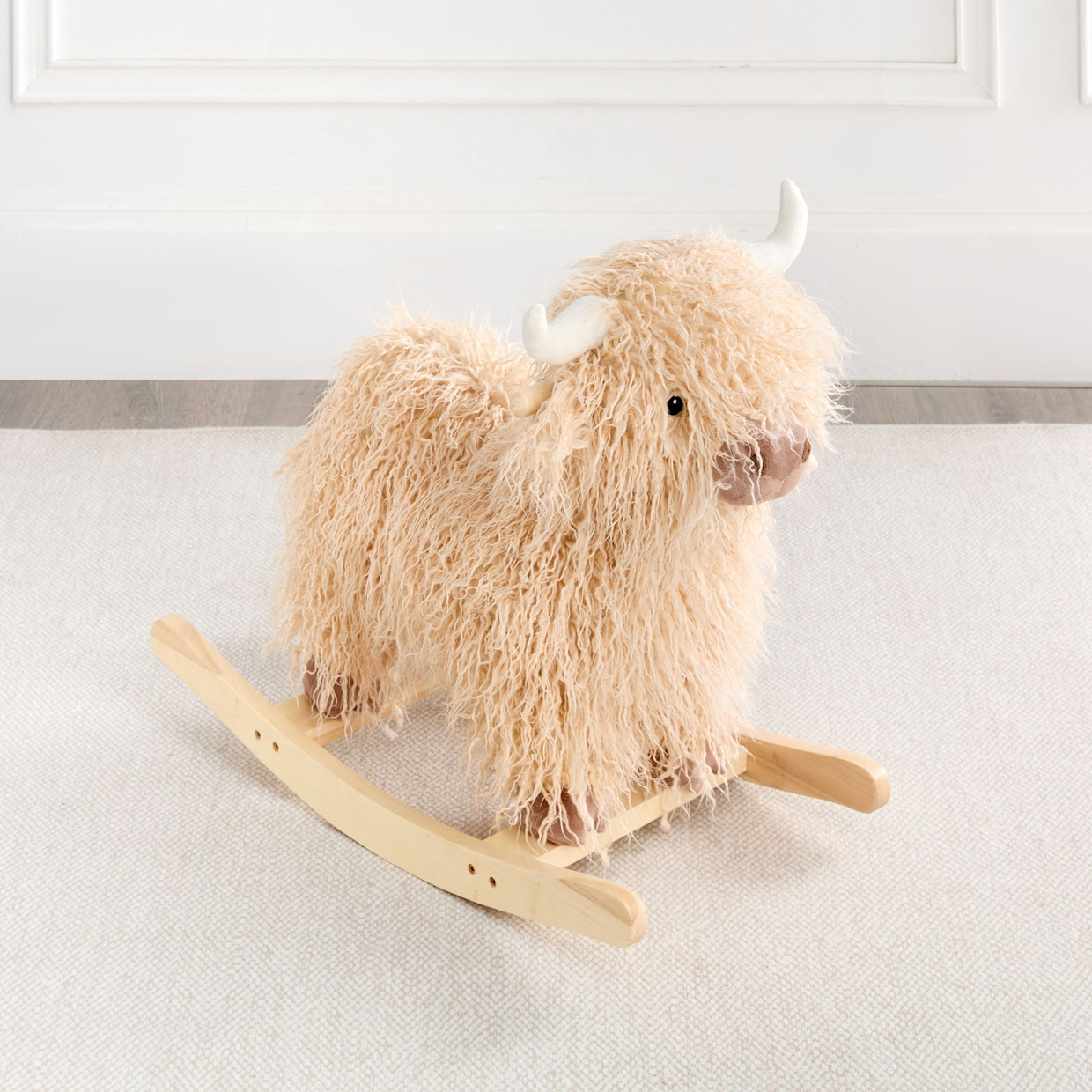 Wonder & Wise Highland Cow Rocker.