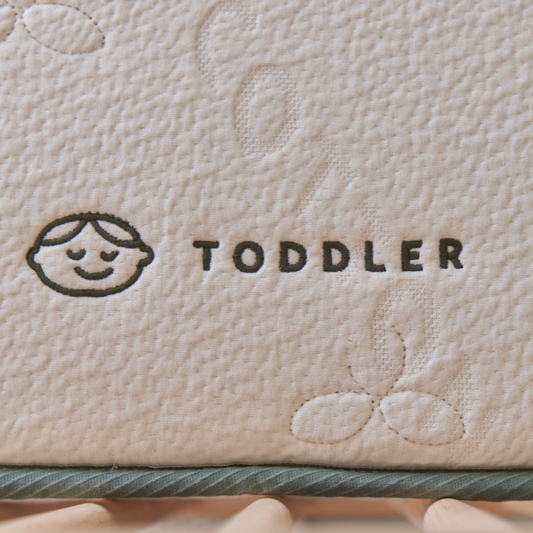 Avocado Mattress Organic Dual-Stage Crib Mattress.