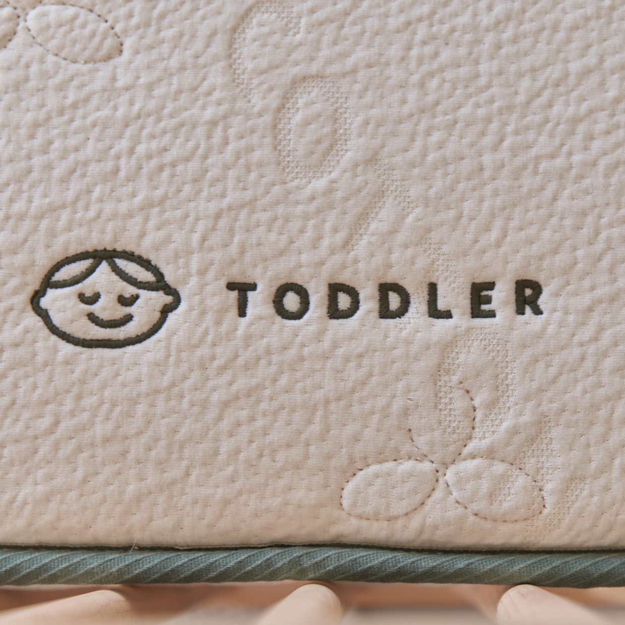 Avocado Mattress Organic Dual-Stage Crib Mattress.