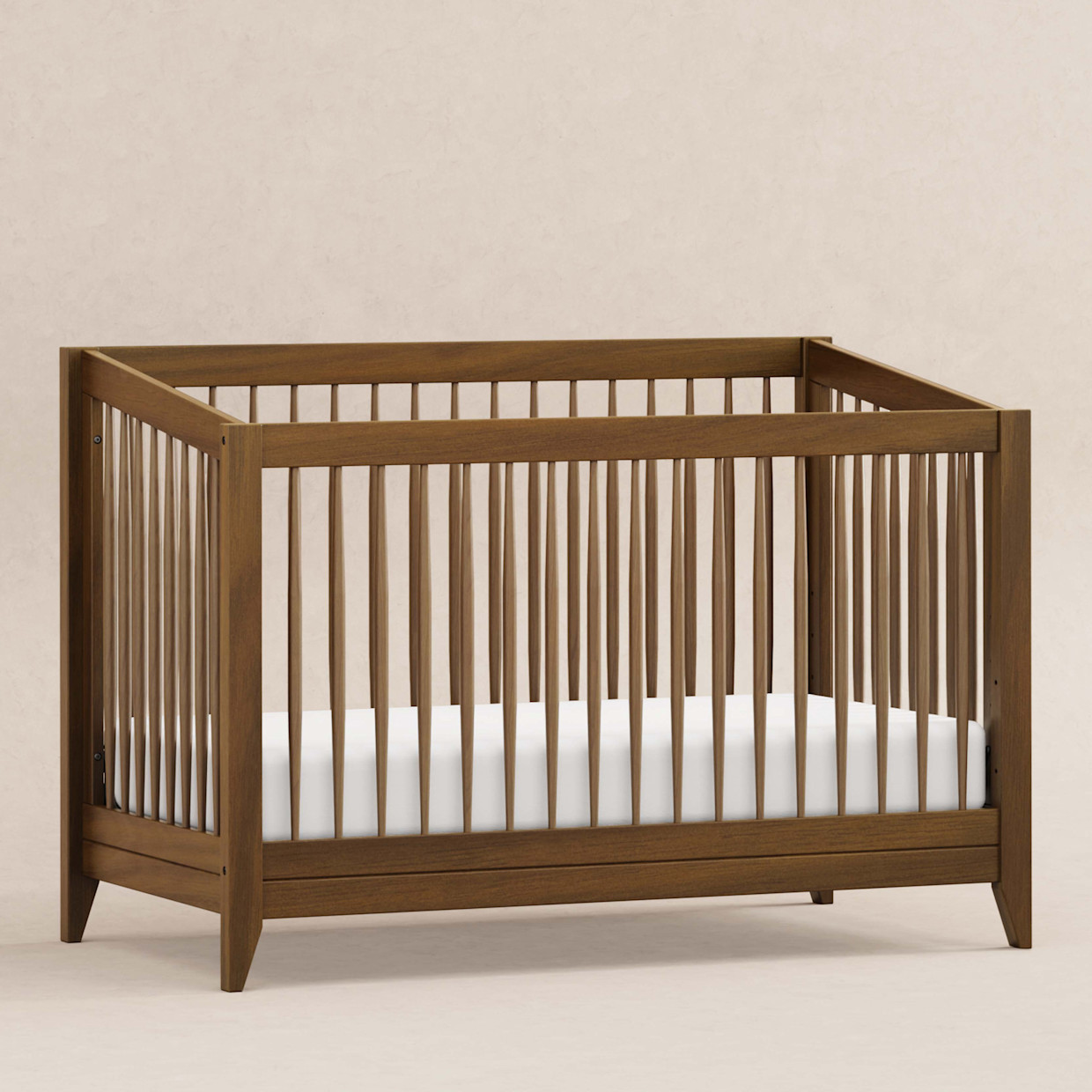 babyletto Sprout 4-in-1 Convertible Crib with Conversion Kit - Natural Walnut.