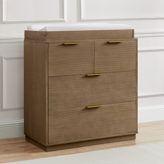 Delta Children Forever 4 Drawer Dresser with Changing Top and Interlocking Drawers.