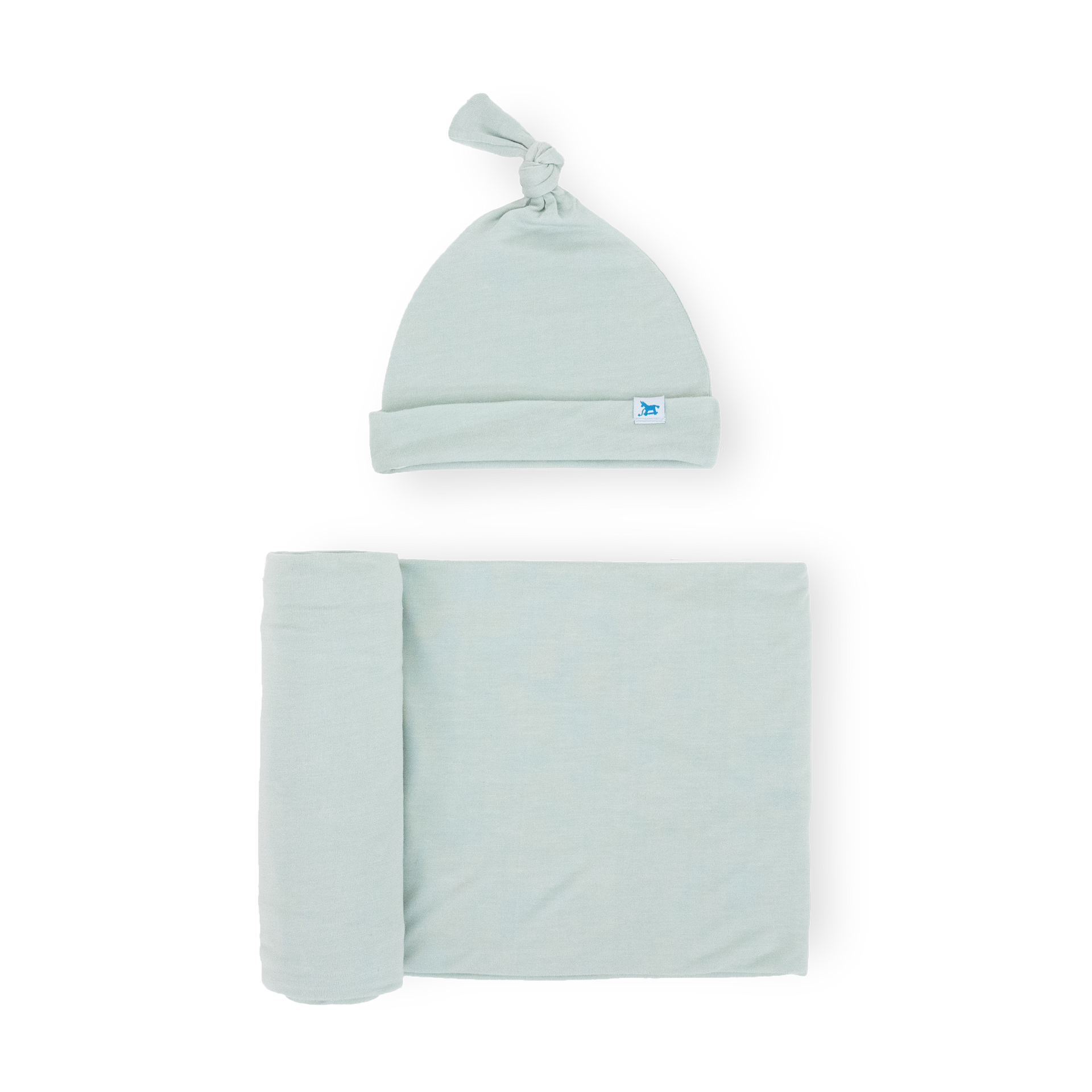 Little Unicorn Stretch Knit Swaddle and Hat Set.