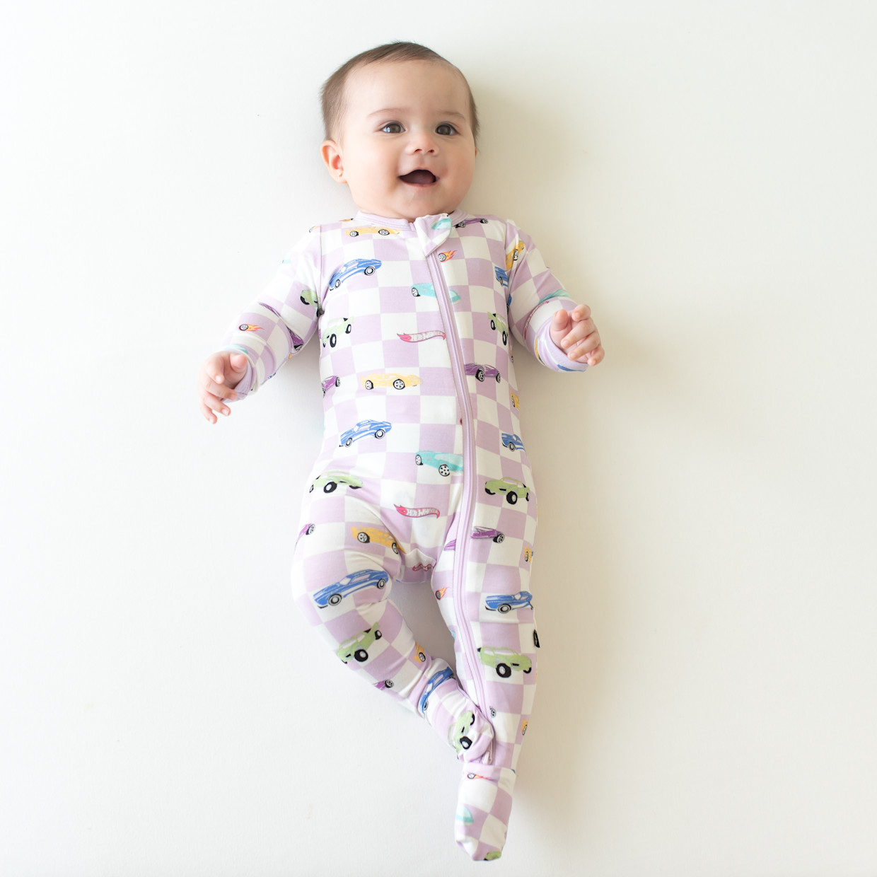 Kyte Baby Printed Zipper Footie - Sparkles And Speed, Newborn.