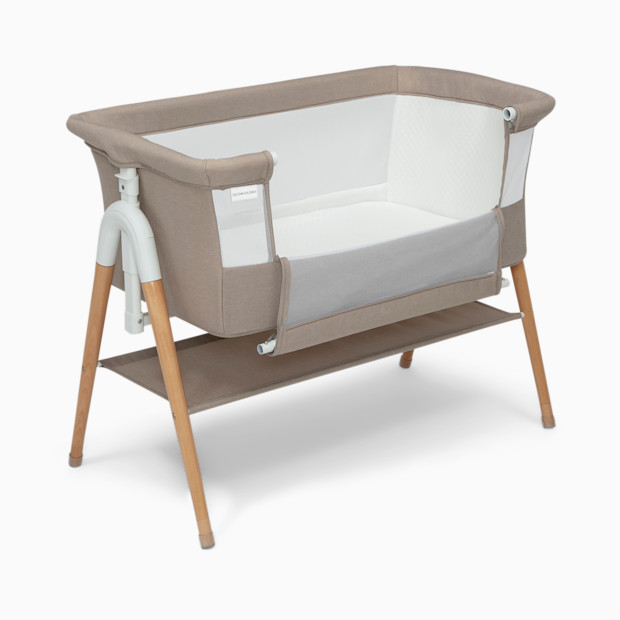 Delta Children Bondi Adjustable Height Bedside Beechwood Bassinet.