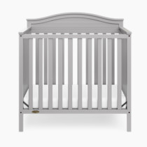 Graco Stella 4-in-1 Convertible Mini Crib with Bonus Mattress (Pebble Gray) – Includes Bonus 2.75 Inch Thick Mattress with Water-Resistant Cover, Converts to Twin Bed, Ideal Crib for Small Spaces
