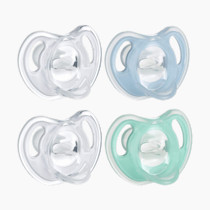 Tommee Tippee Ultra-Light Silicone Pacifier, 0-6 Months, Symmetrical One-Piece Design, BPA-Free Silicone Binkies, Clear/Blue/Green, Pack of 4