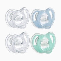Tommee Tippee Ultra-Light Silicone Pacifier, 0-6 Months, Symmetrical One-Piece Design, BPA-Free Silicone Binkies, Clear/Blue/Green, Pack of 4