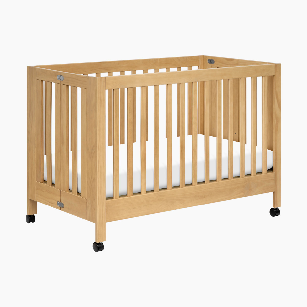 babyletto Maki Portable Folding Crib with Toddler Bed Conversion Kit - Honey.