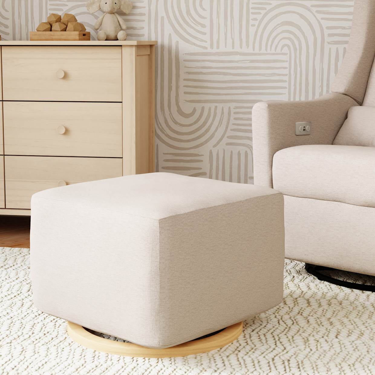 babyletto Kiwi Gliding Ottoman - Performance Beach Eco-Weave With Light Wood Base.
