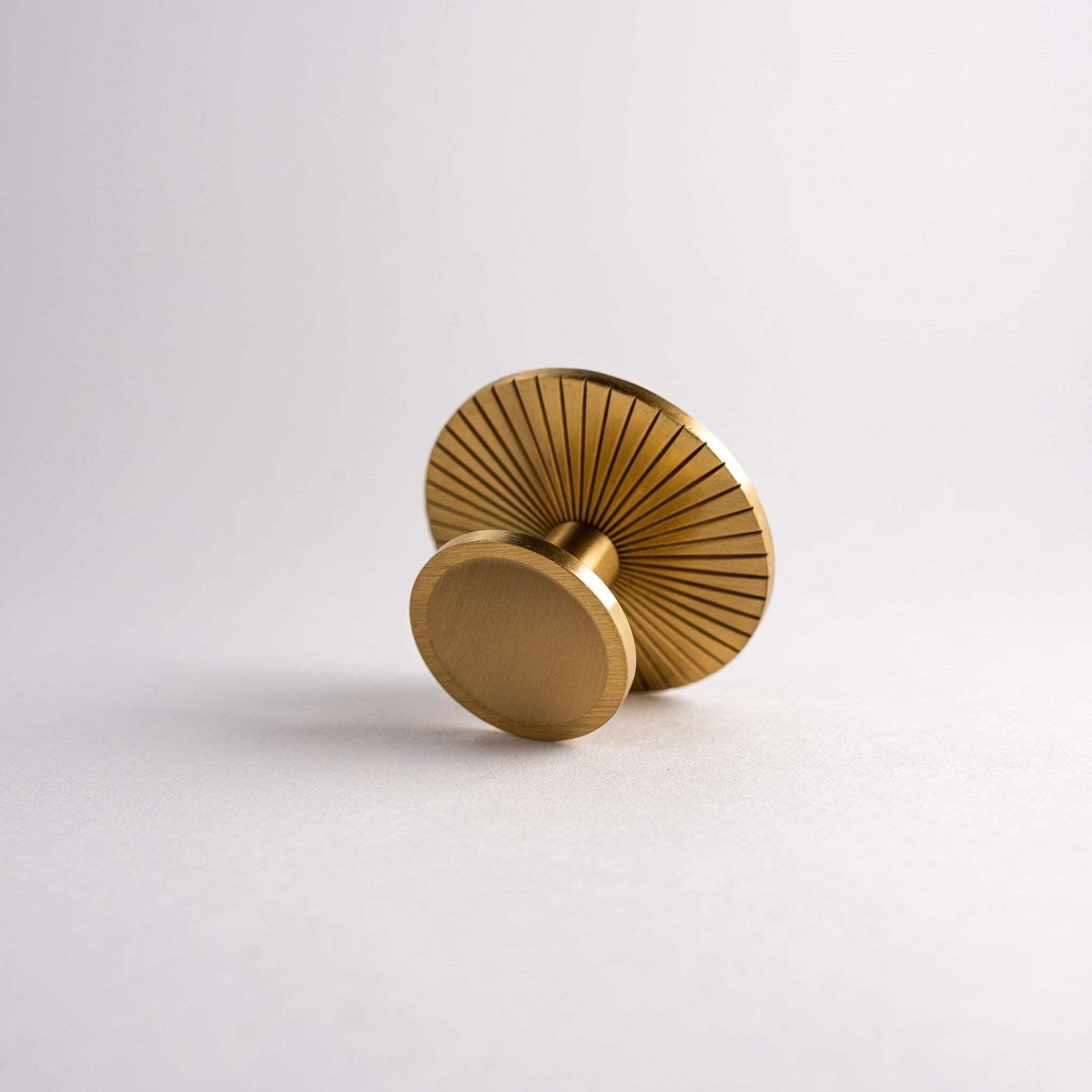 Inspire Hardware Brass Cabinet Knobs.