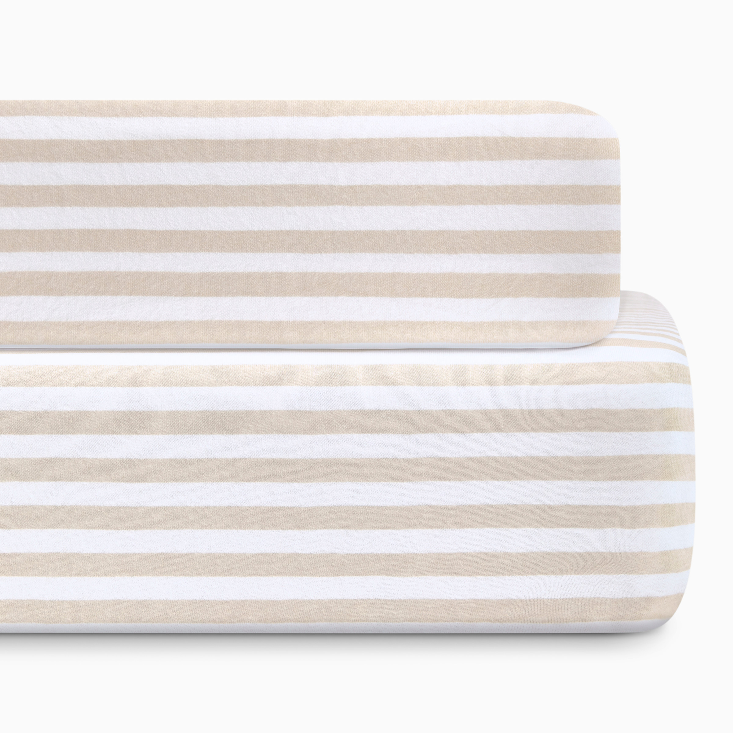 Close-up of striped crib sheet fabric in beige and white.