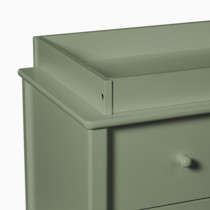 Close-up of dresser top with changing tray