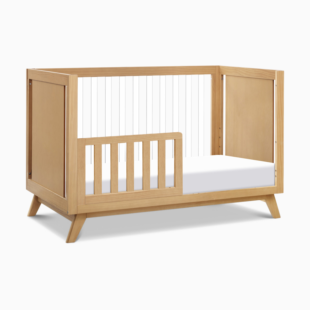 daVinci Acrylic Otto 3-in-1 Convertible Crib - Honey/Acrylic.