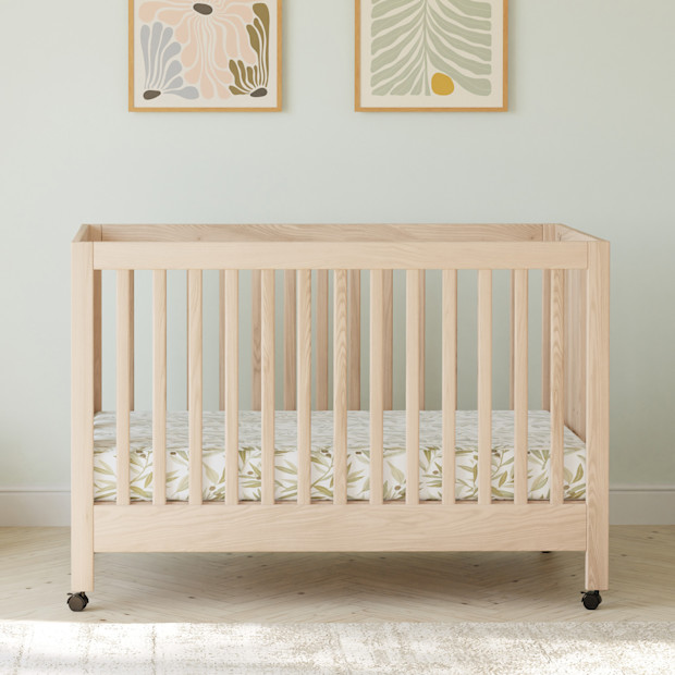 babyletto Maki Portable Folding Crib with Toddler Bed Conversion Kit.