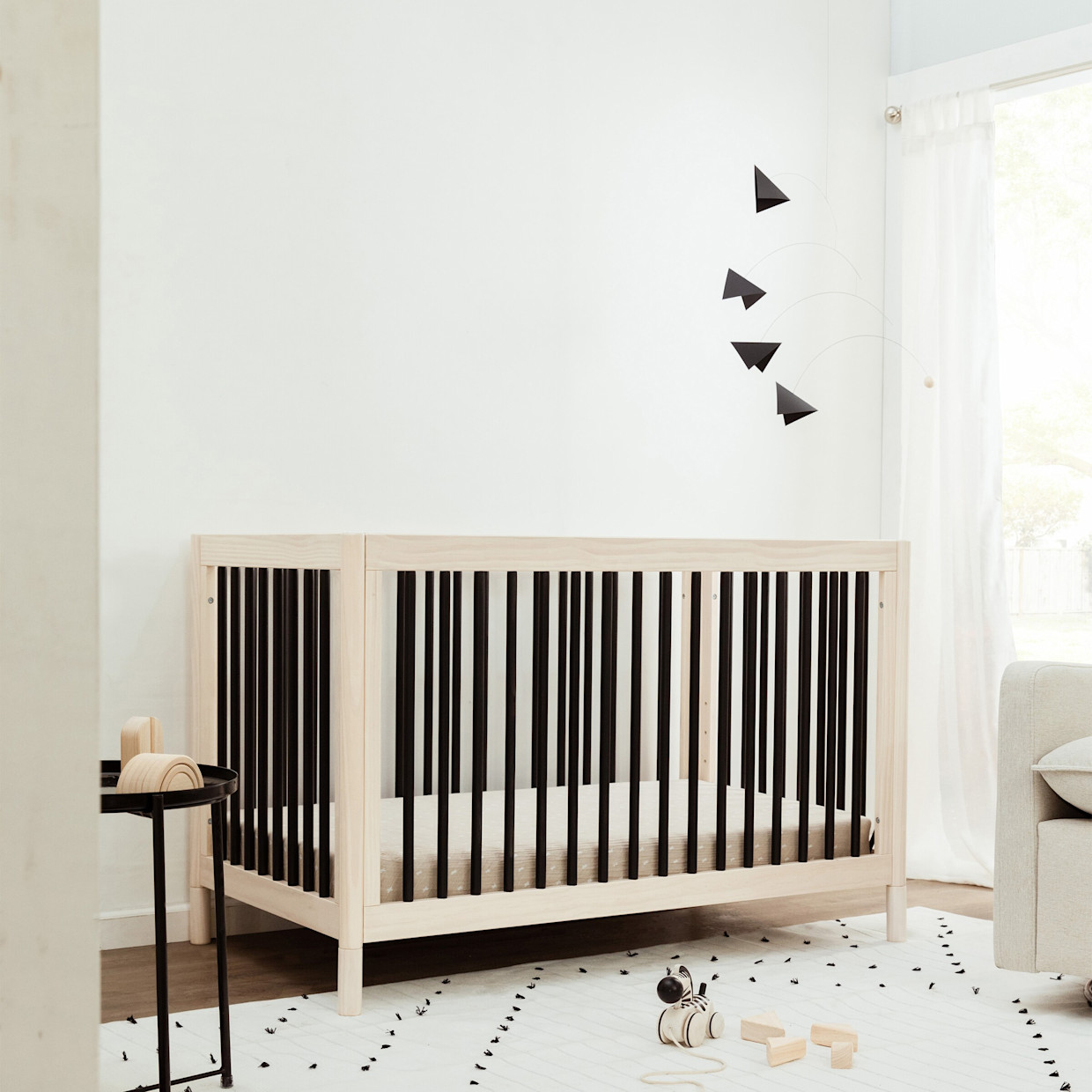 babyletto Gelato 4-in-1 Convertible Crib with Toddler Bed Conversion Kit - Washed Natural / Black.