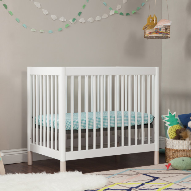 babyletto Gelato 4-in-1 Convertible Mini Crib - White Finish With Washed Natural Feet.