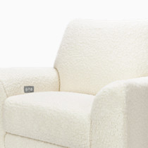 Close-up of chair arm and tag on boucle fabric