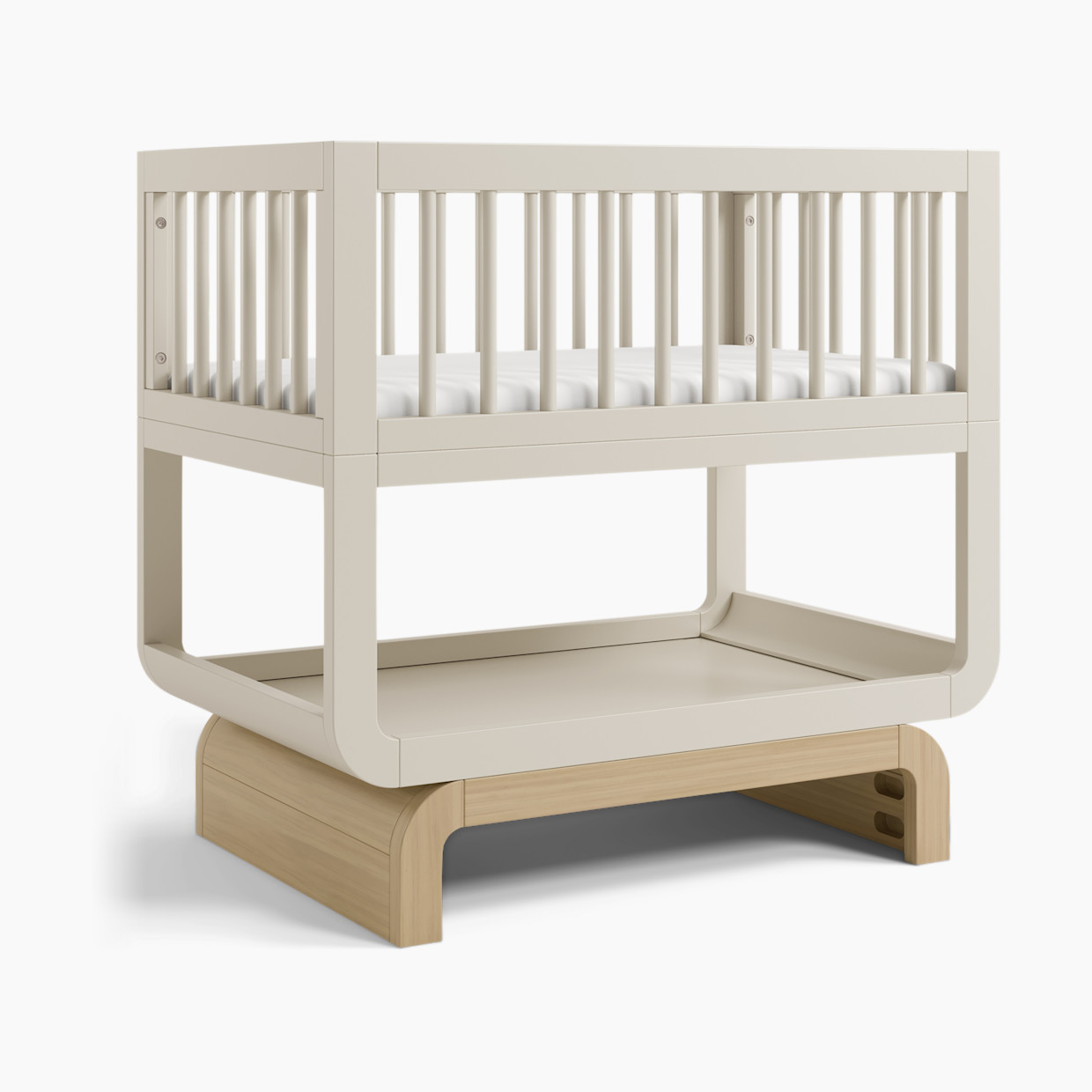 Storkcraft Santorini Deluxe 3-in-1 Convertible Bassinet - Frosted Oat With Driftwood.