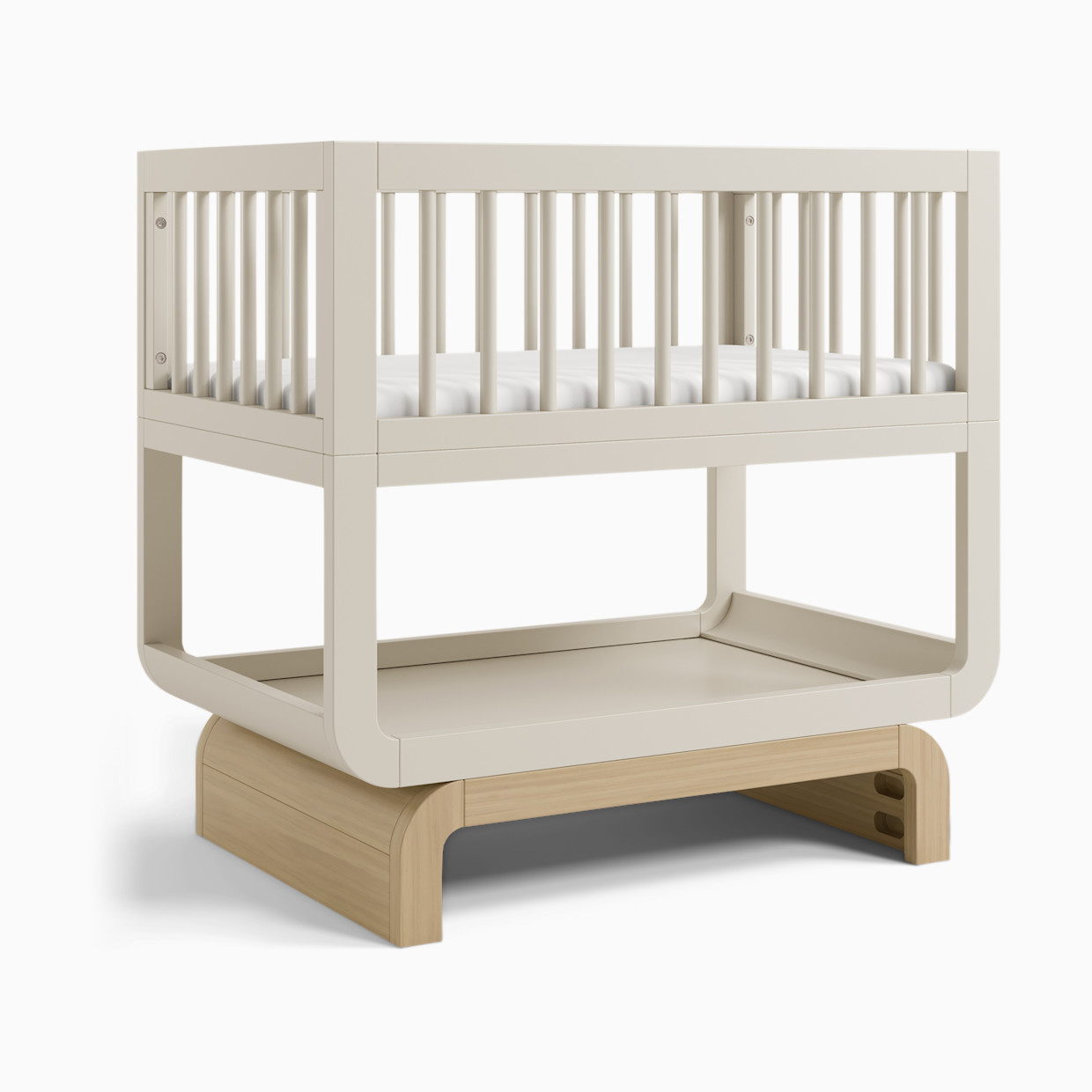 Storkcraft Santorini Deluxe 3-in-1 Convertible Bassinet - Frosted Oat With Driftwood.