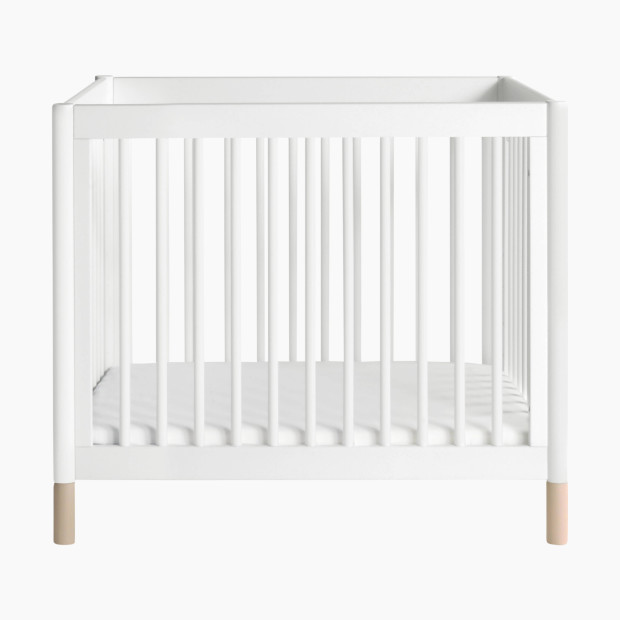 babyletto Gelato 4-in-1 Convertible Mini Crib - White Finish with Washed Natural Feet - $299.00.
