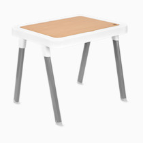 Table top insert in wood finish on a white-framed toddler table with grey legs