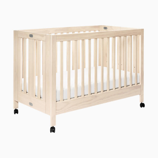 babyletto Maki Portable Folding Crib with Toddler Bed Conversion Kit.