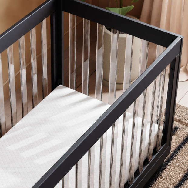 babyletto Harlow Acrylic 3-in-1 Convertible Crib with Toddler Bed Conversion Kit - Black With Black Base And Acrylic Slats.