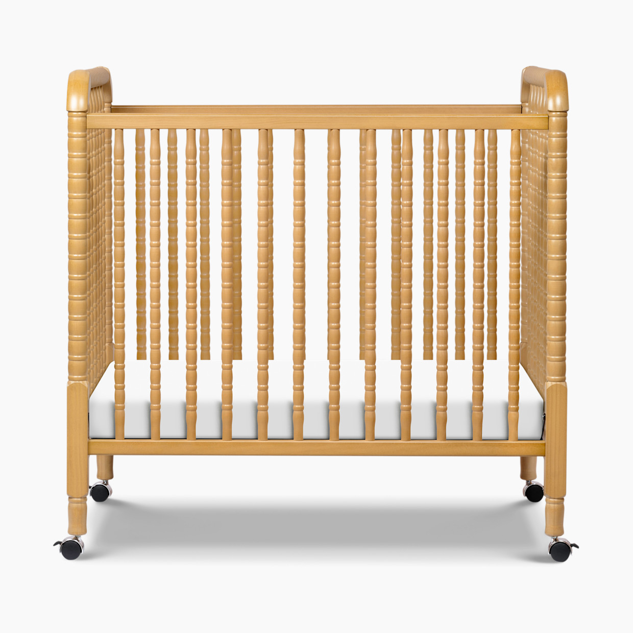 daVinci Jenny Lind 3-in-1 Convertible Mini Crib - Honey.