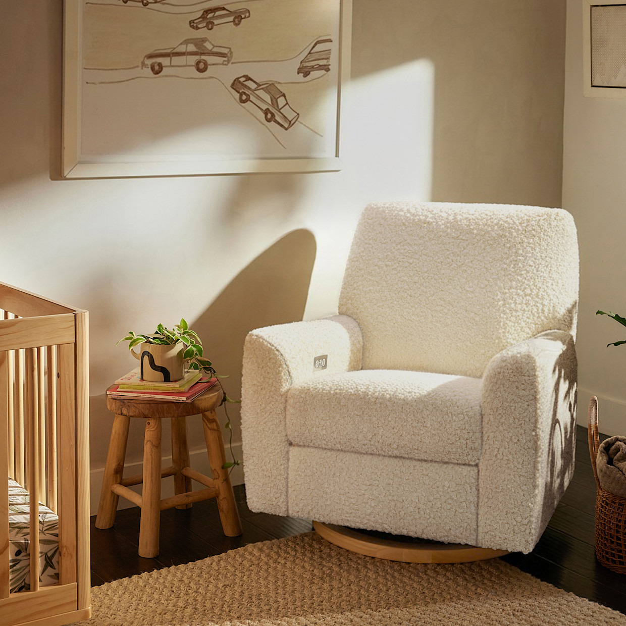 Nursery Works Sunday Power Recliner and Swivel Glider - Cream Shearling With Light Wood Base.
