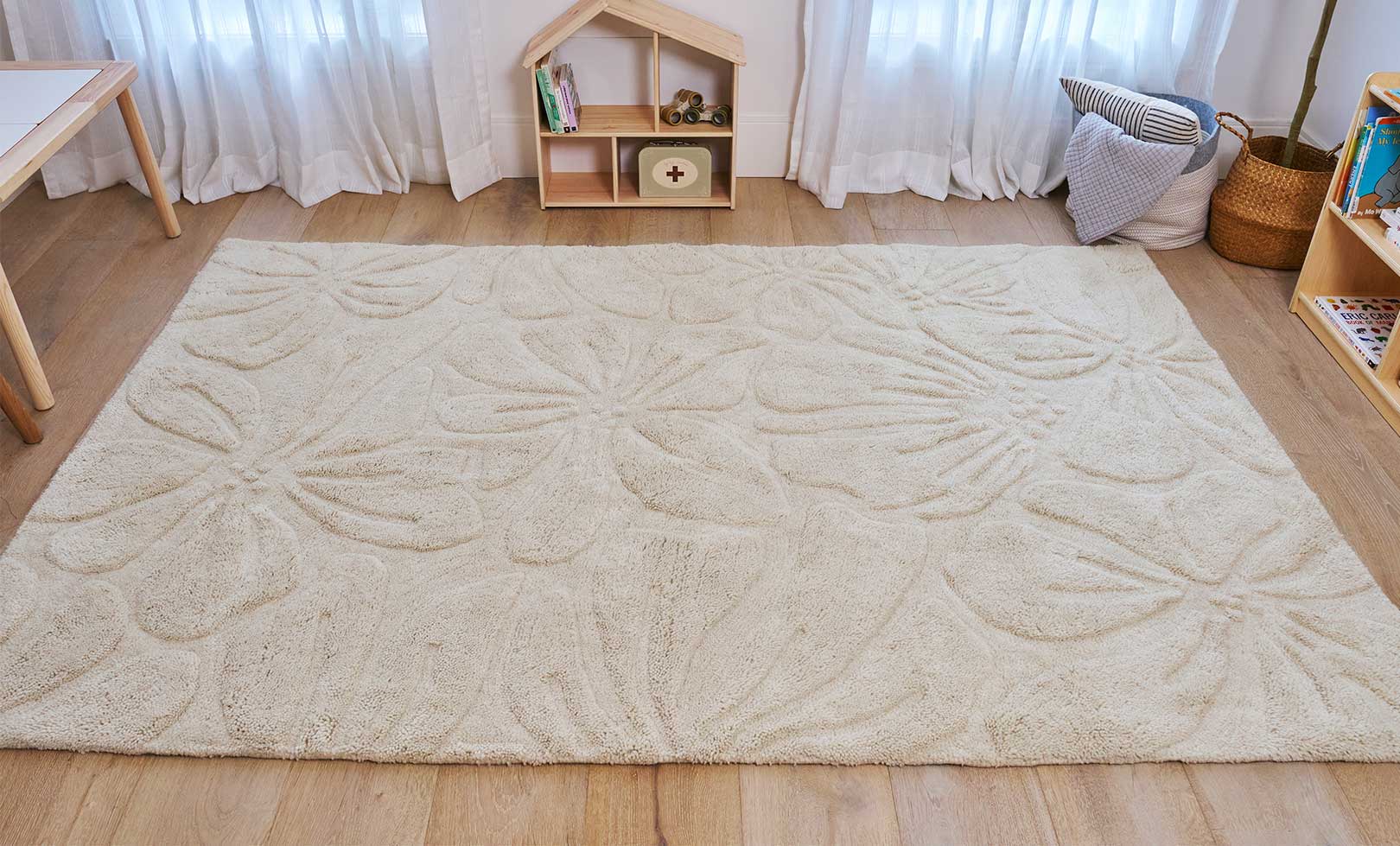 Sage & Wild Floral Field Washable Wool Area Rug in Cream.