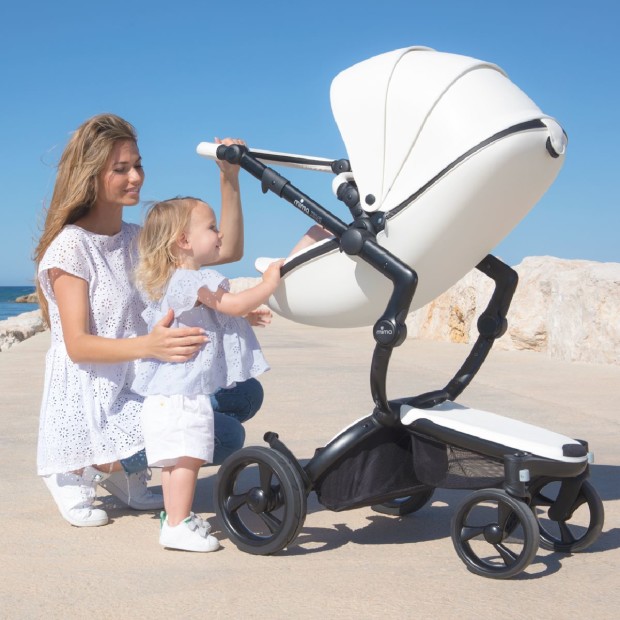 Mima Xari Black Chassis Stroller with Reversible Reclining Seat & Carrycot - Black & White/ Black Seat Box.