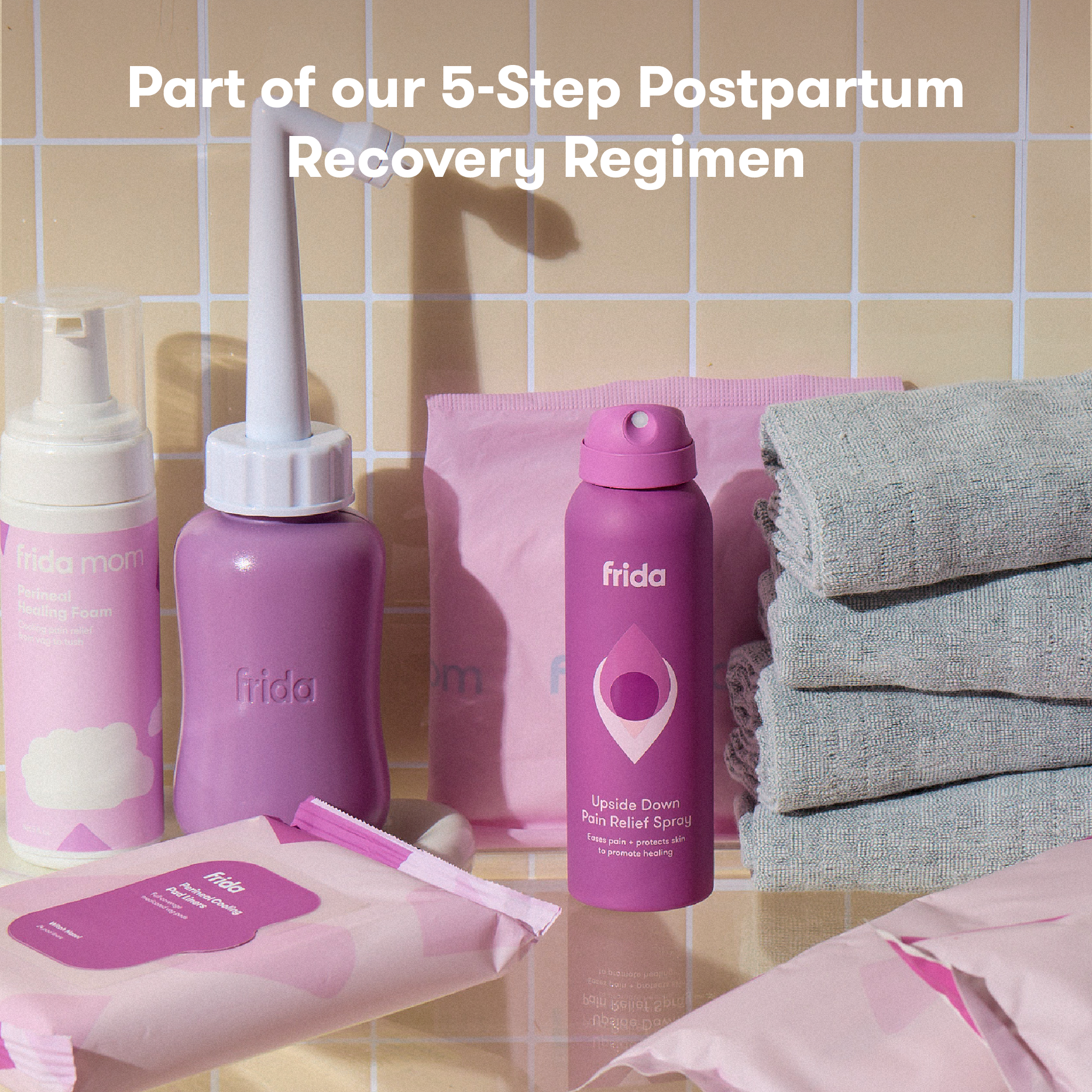 Frida Mom Upside Down Pain Relief Spray.