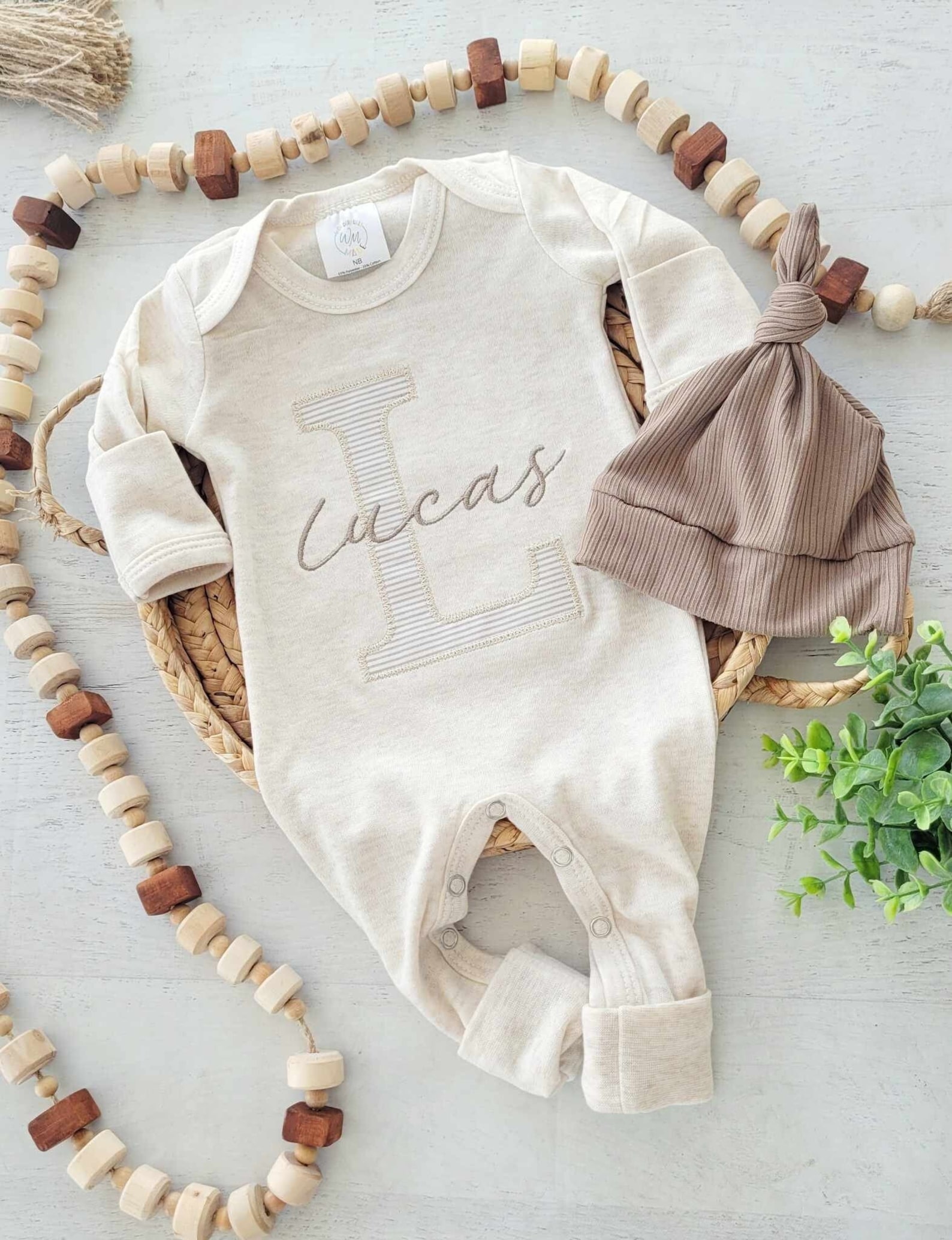 Personalized Baby Romper and Hat Set.