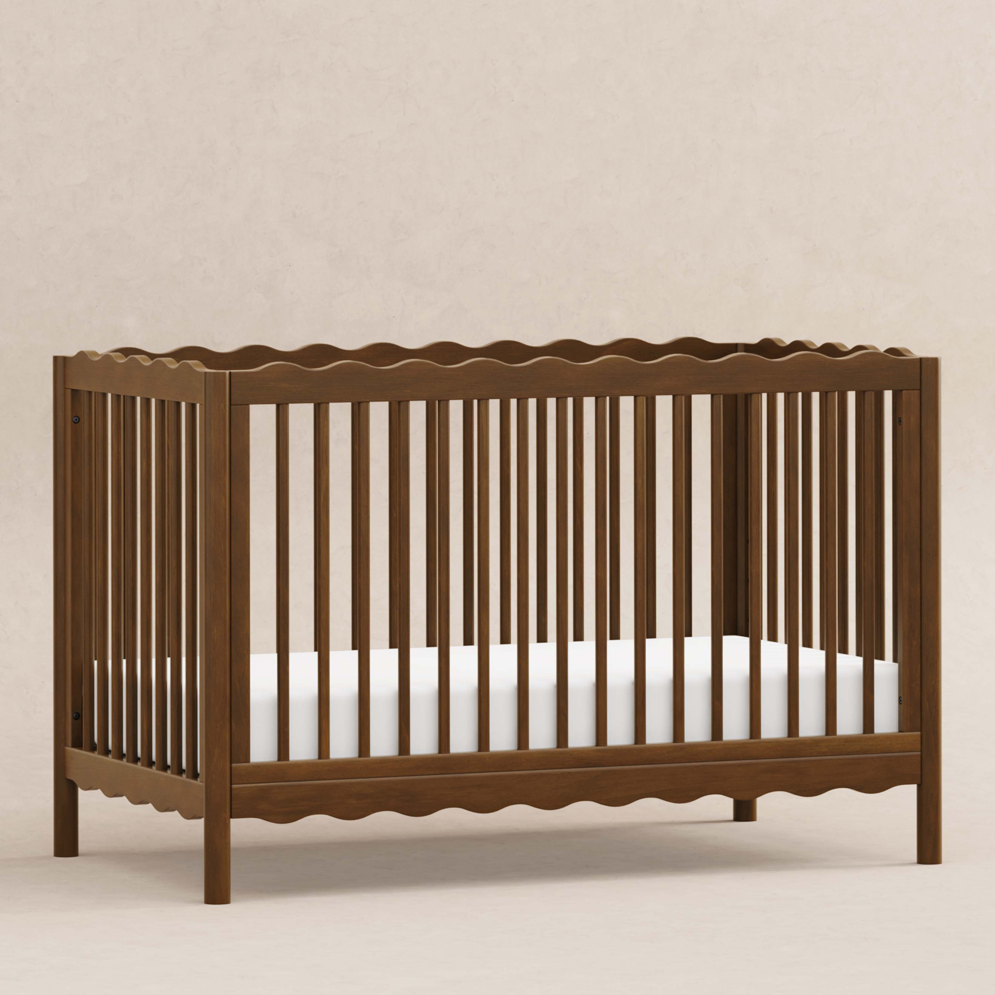babyletto Swell 4-in-1 Convertible Crib with Conversion Kit - Natural Walnut.