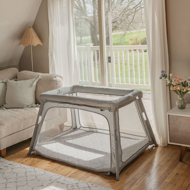 Newton Baby Deluxe Travel Crib & Play Yard.