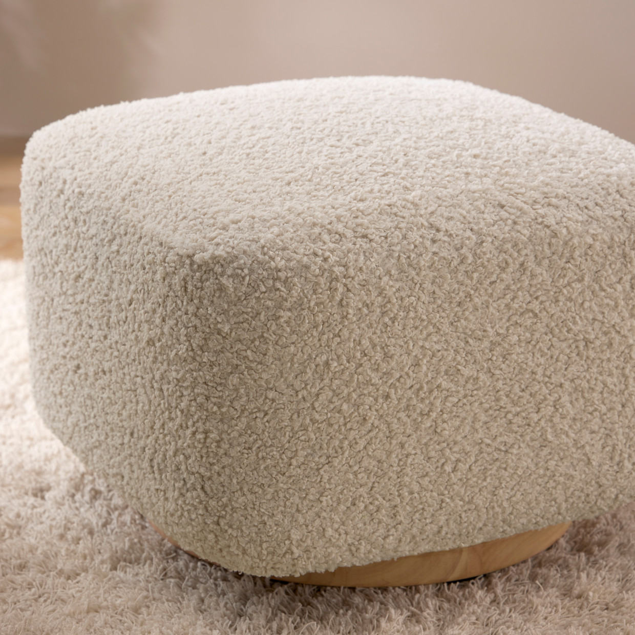babyletto Kiwi Gliding Ottoman - Almond Teddy Loop With Light Wood Base.