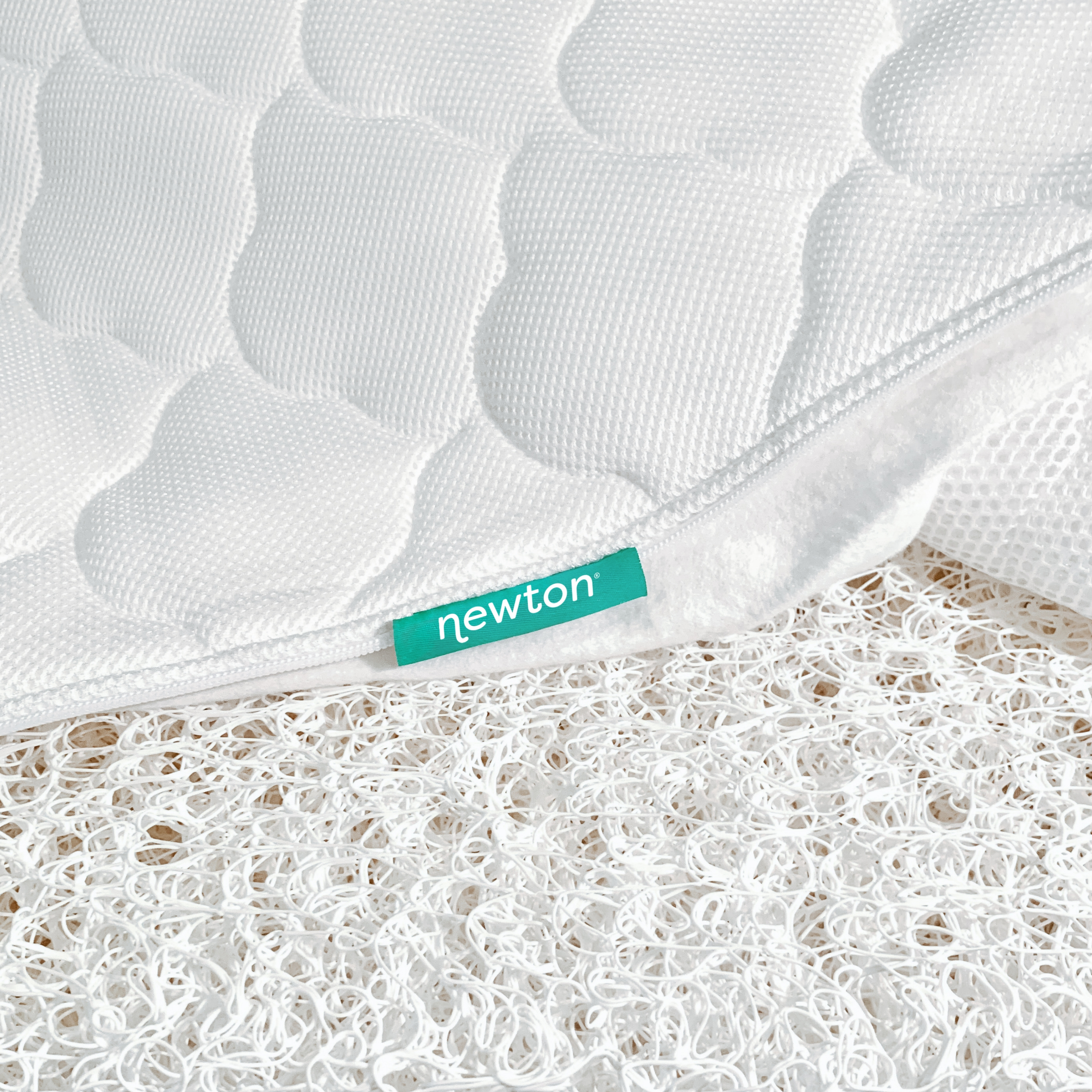 Newton Baby Breathable 2-Stage Crib Mattress.