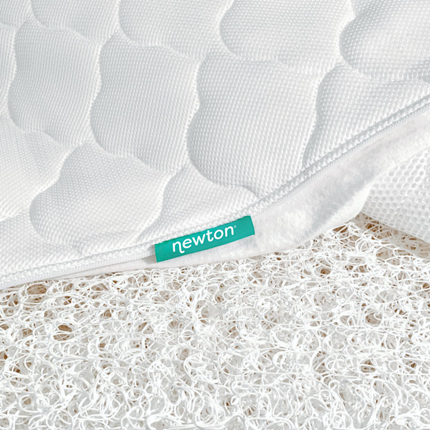 Newton Baby Breathable 2-Stage Crib Mattress.