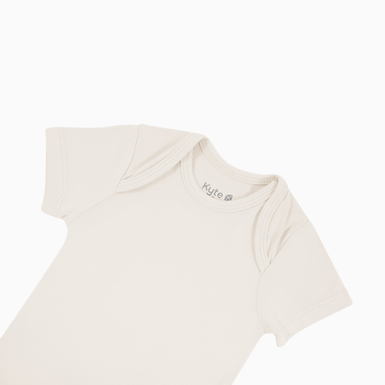 Kyte Baby Short Sleeve Bodysuit - Oat, Newborn.
