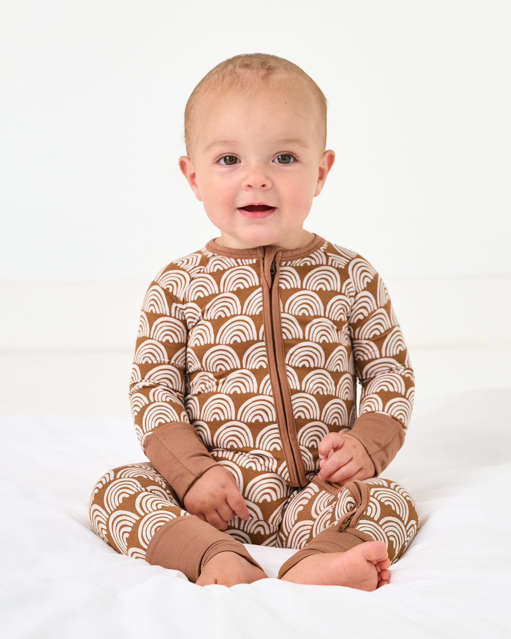 Little Sleepies Rust Rainbows Zippy.