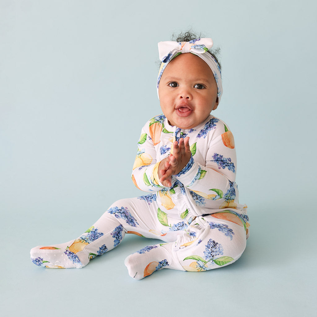 Posh Peanut Sorrento Footie Ruffled Zippered One Piece.