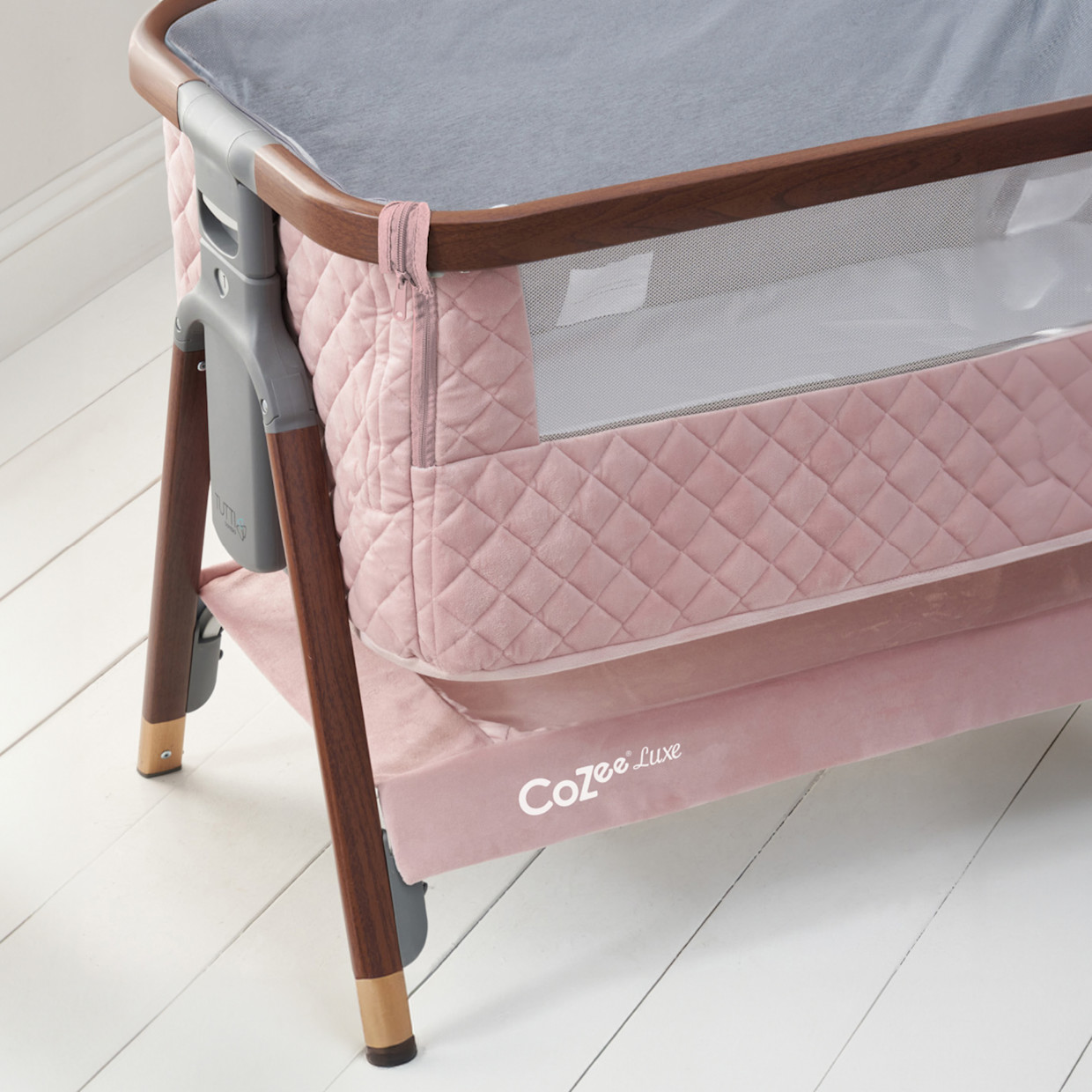 Tutti Bambini CoZee Luxe Bedside Crib - Walnut/Blush Pink.