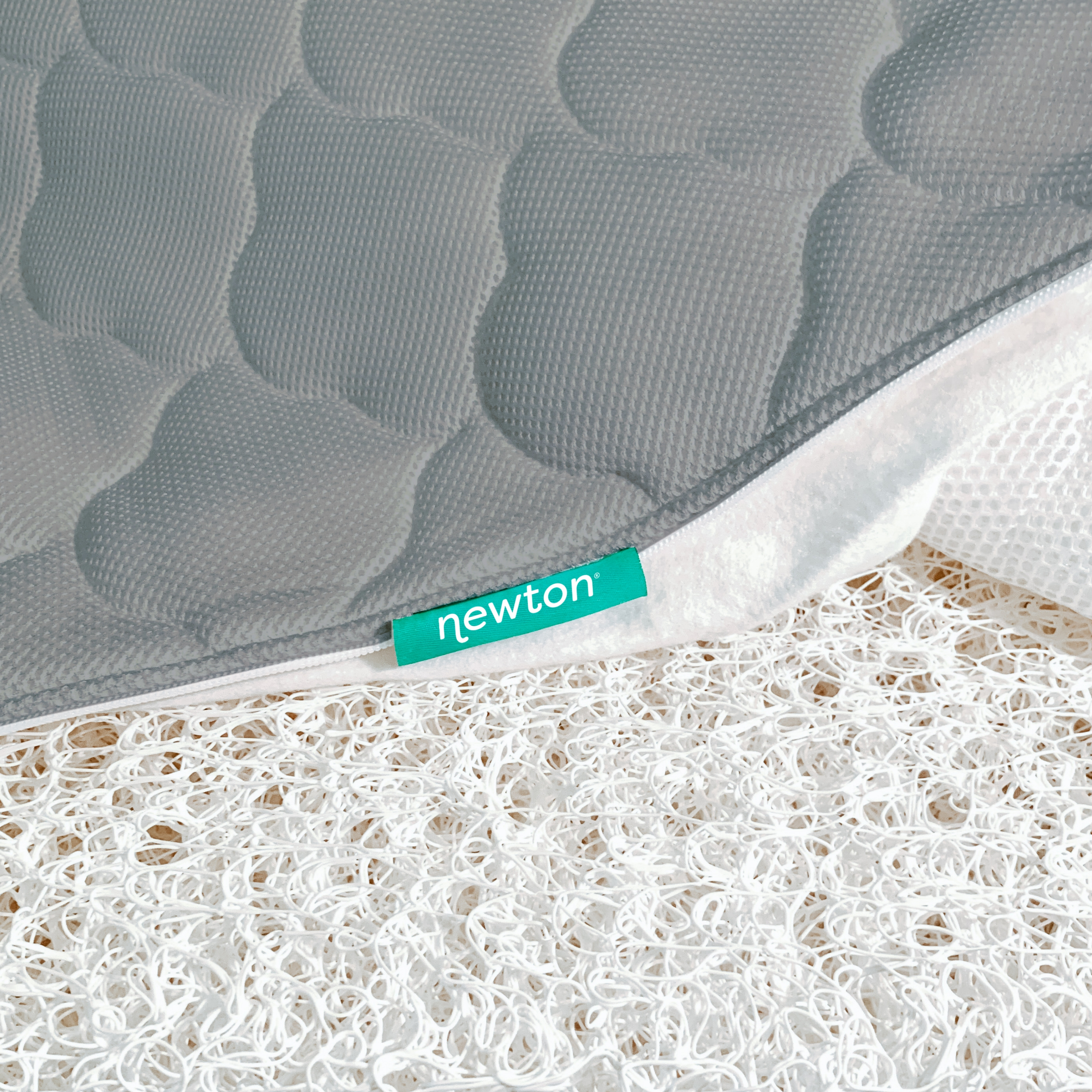 Newton Baby Breathable 2-Stage Crib Mattress.