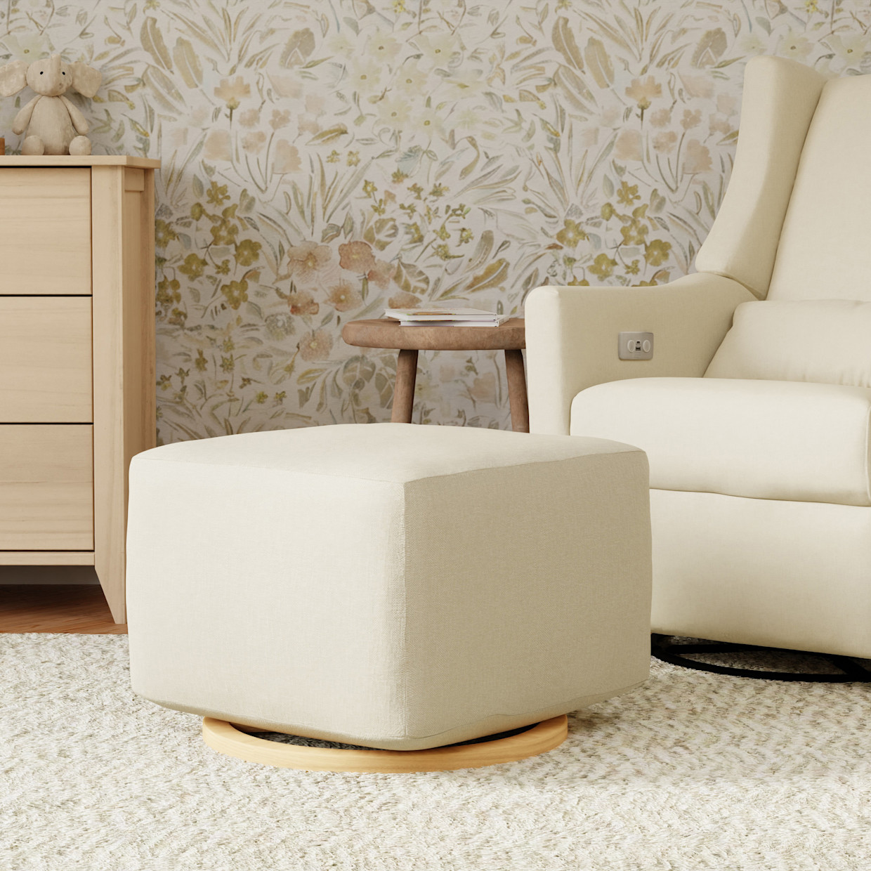 babyletto Kiwi Gliding Ottoman - Performance Cream Eco-Weave With Light Wood Base.